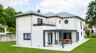 Média réf. 257 (90/110): Maisons E.R.M.I. : photo d'une maison individuelle sur mesure